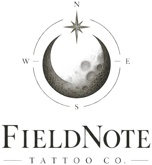 FieldNote Tattoo Co. logo: an engraved crescent moon inside a compass ring, above the FieldNote Tattoo Co. wordmark